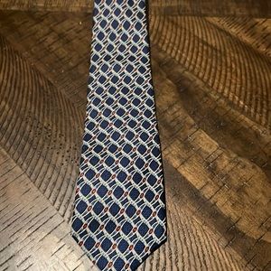 Dockers tie -3” wide at bottom. Blue burgundy gray design